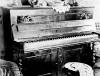 Photo of 1860's Piano in
                                    Kelly's Hotel, Barkerville, B.C.