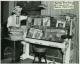 Photo of Ragtime Bob Darch
                                  next to his piano, circa 1969